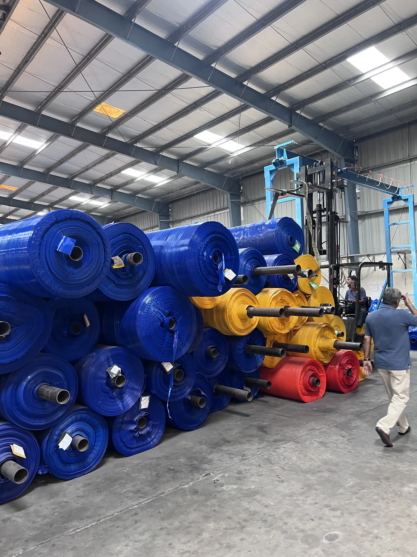 Stacked Tarpaulin Rolls at the PMA Industries Factory